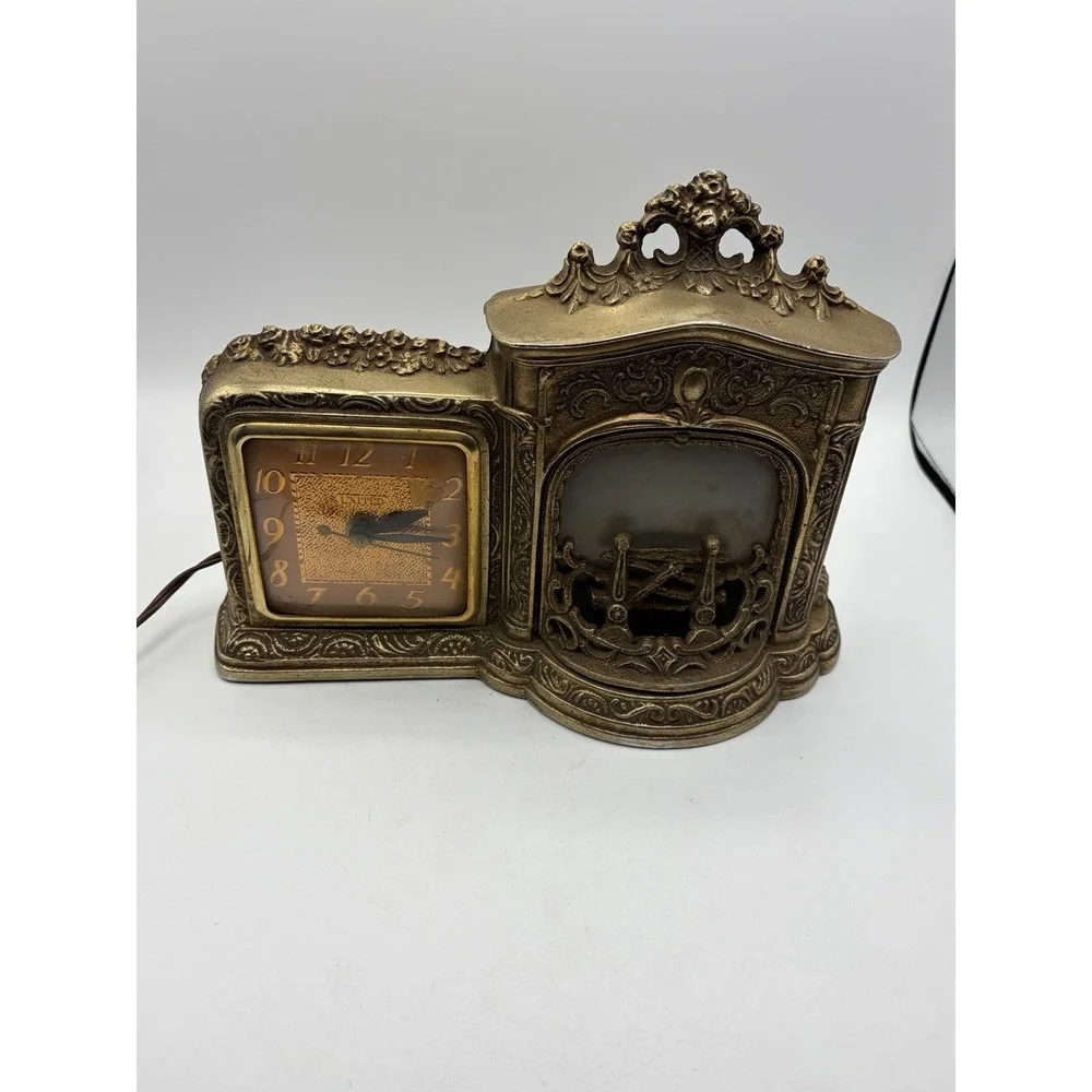 United Clock Corp. Model 455 Mantel Clock w/ Fireplace Light,‎ Good